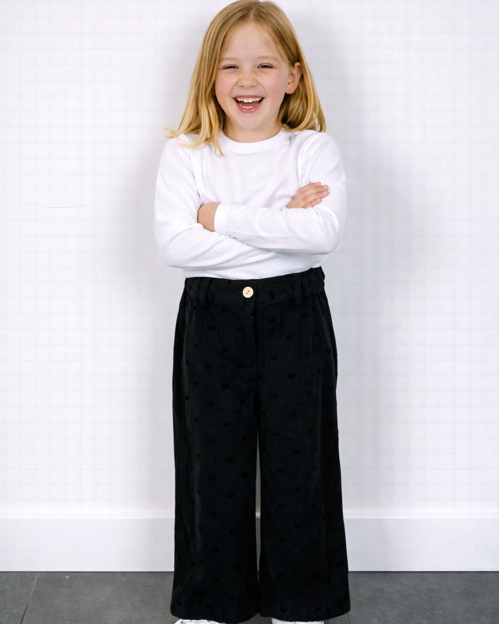Zwarte strikjes broek