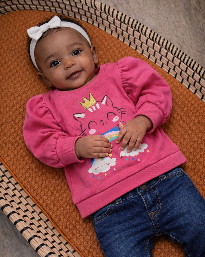 Roze pofmouwen trui 