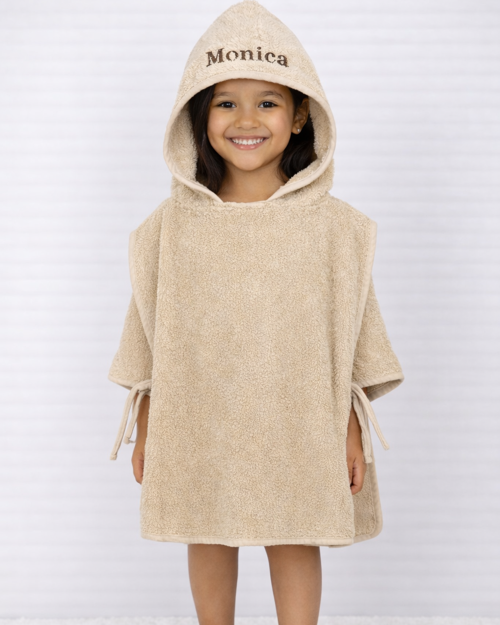 Badponcho beige naam