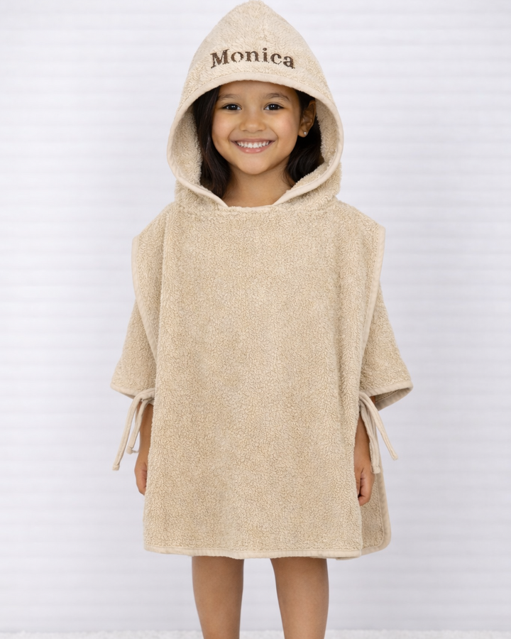 Badponcho beige naam