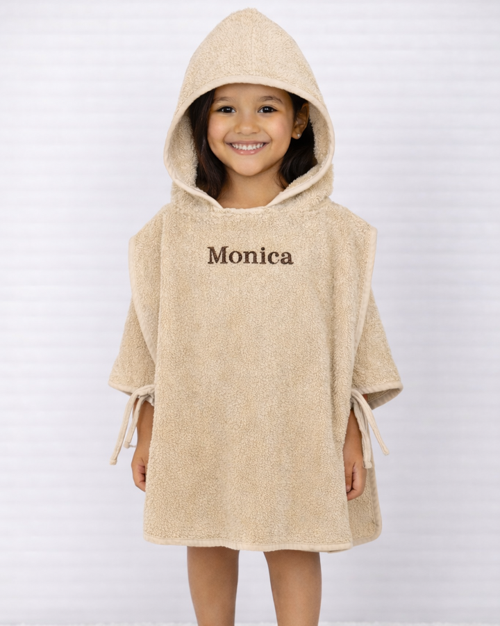 Badponcho beige naam