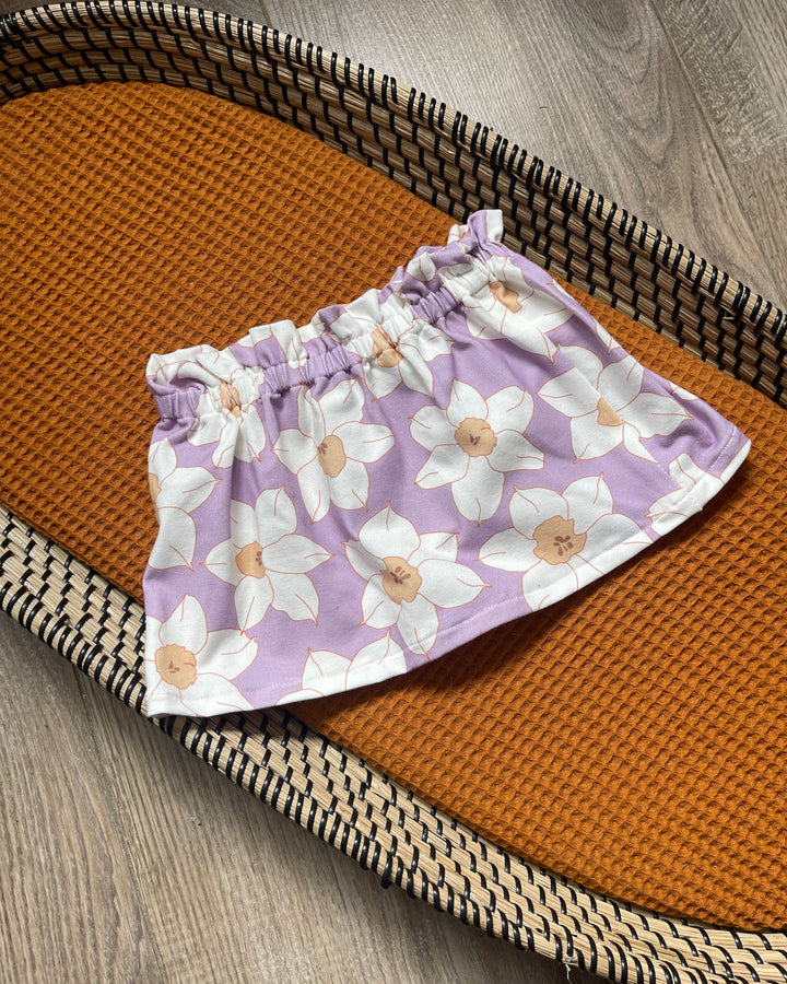 Meisjes dreumes rokje lila met witte madelief bloemen