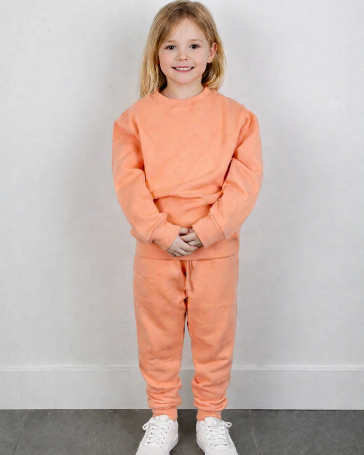 Smile meisje perzik joggingpak